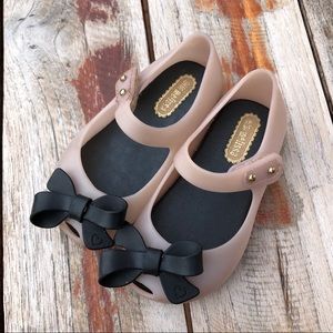 Mini Melissa pink shoes with black bow size 6